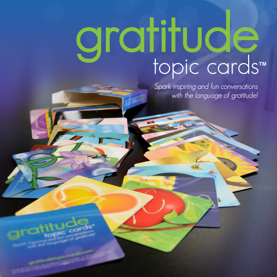 Image of colorful, 3.5"x3.5" glossy cards spilled onto a table. Shows the variety of cards in the GTC deck.
